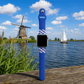 Friesland Apple Watch bandje met Friese vlag en windmolens op de achtergrond.